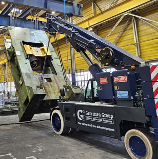 Gerritsen pick and carry crane dismantling machinery with hydraulic lifting system. 