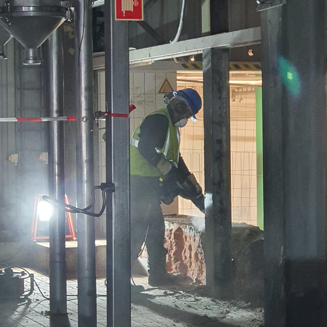 Demolition work with all safety measures in place. 